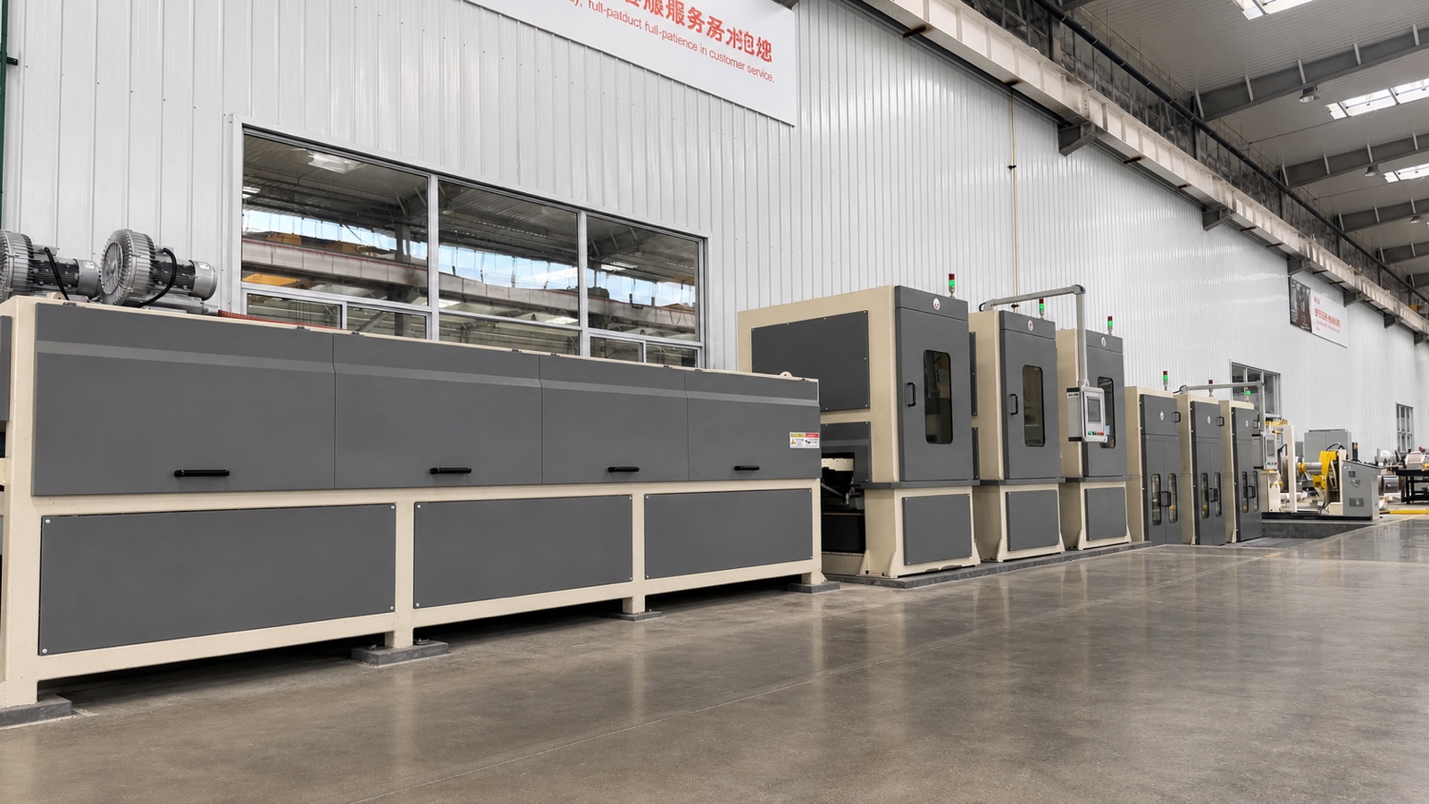 Side perspective of the enclosed wet polishing line