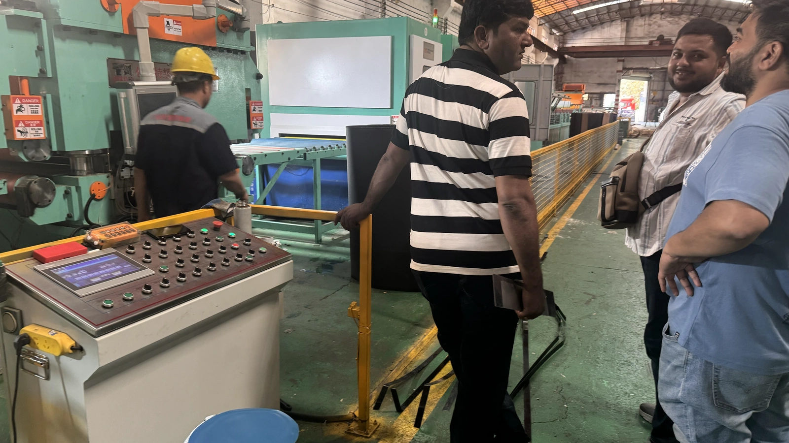 Indian delegation visiting an operating coil-to-coil polishing line