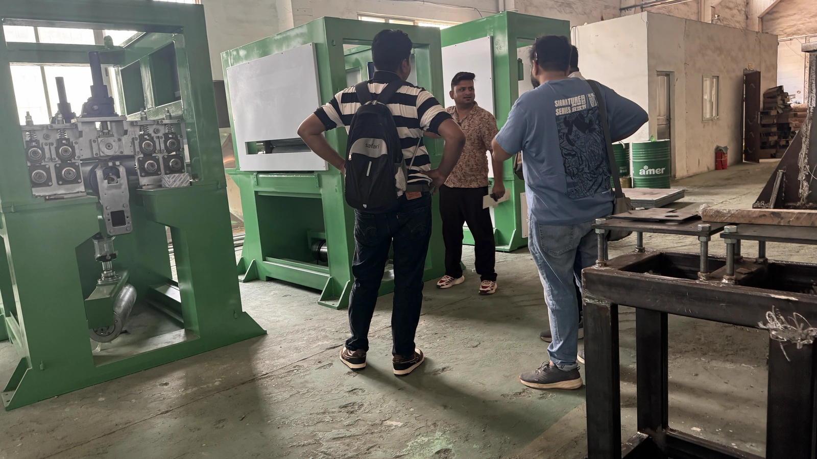 AMIT team inspecting sheet-to-sheet polishing machine equipment