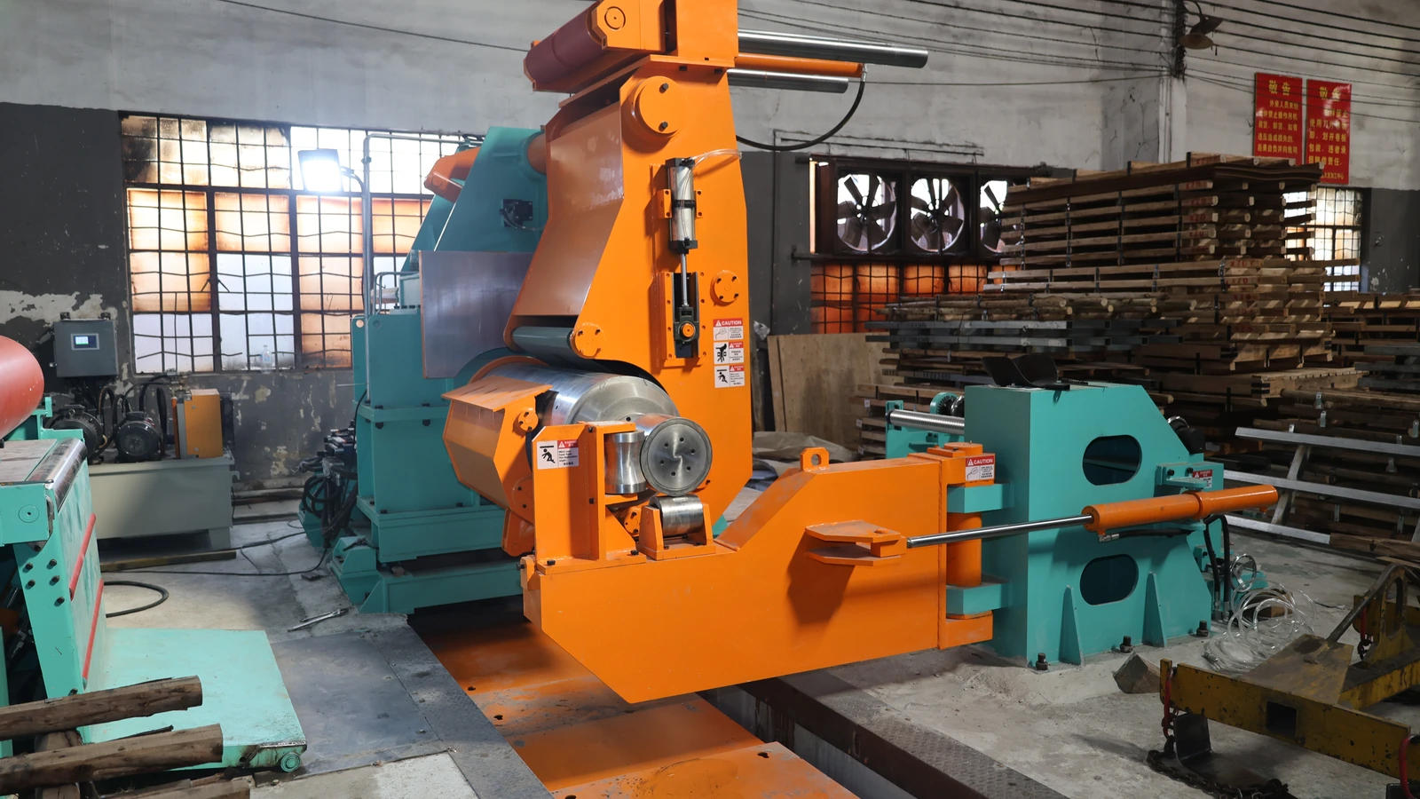Close view of the decoiler and recoiler equipment on the 1300 mm stainless steel coil polishing line