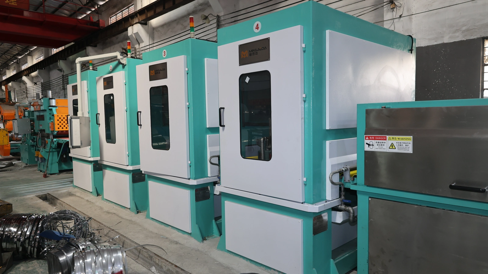 Four enclosed No.4 polishing heads on the 1300 mm stainless steel coil line