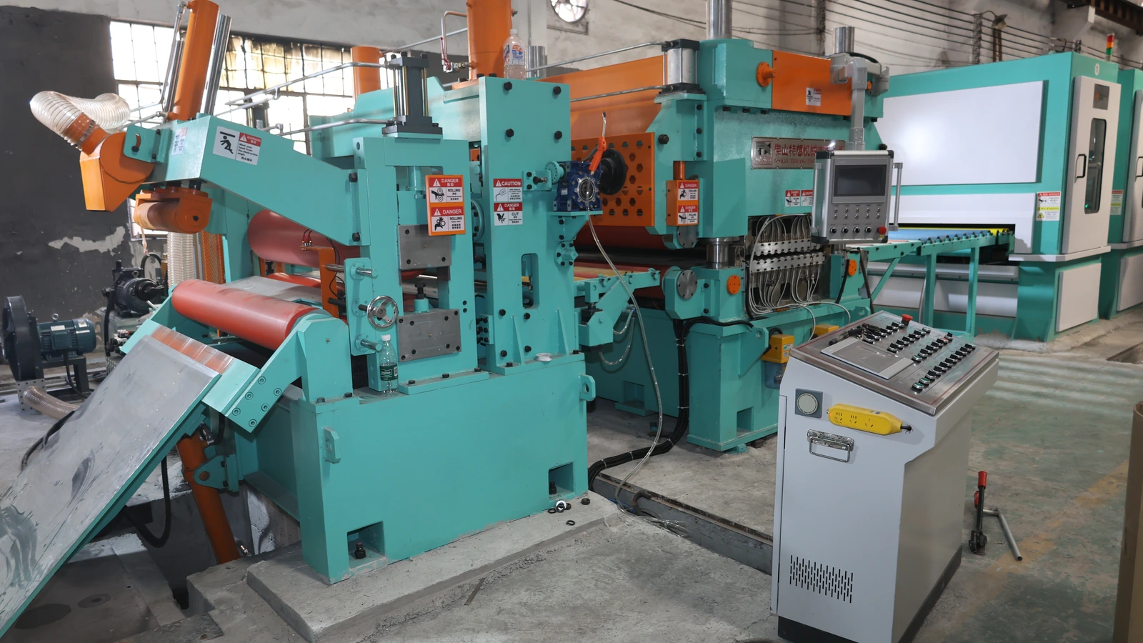 Exit handling and local operator control section of the 1300 mm stainless steel polishing line