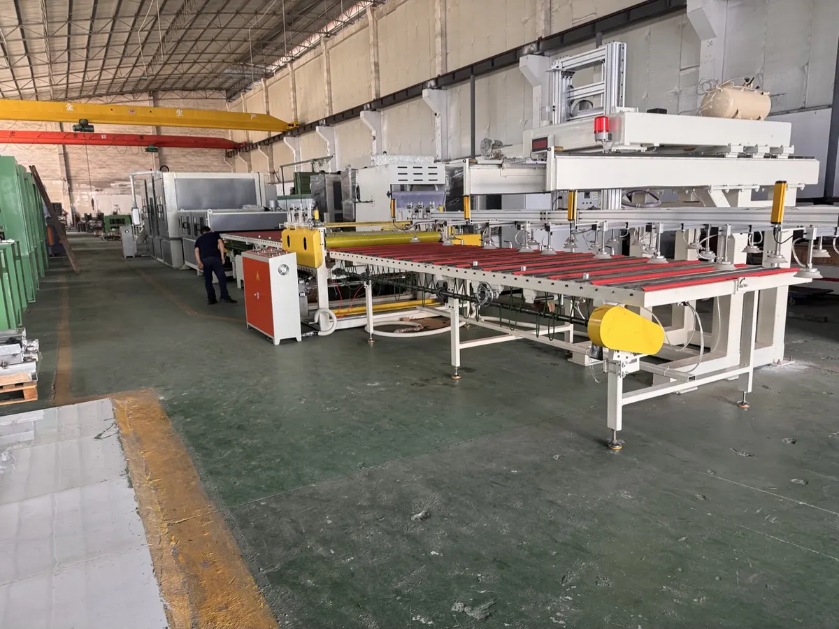 Sheet-to-sheet abrasive belt grinding line with automatic loading table